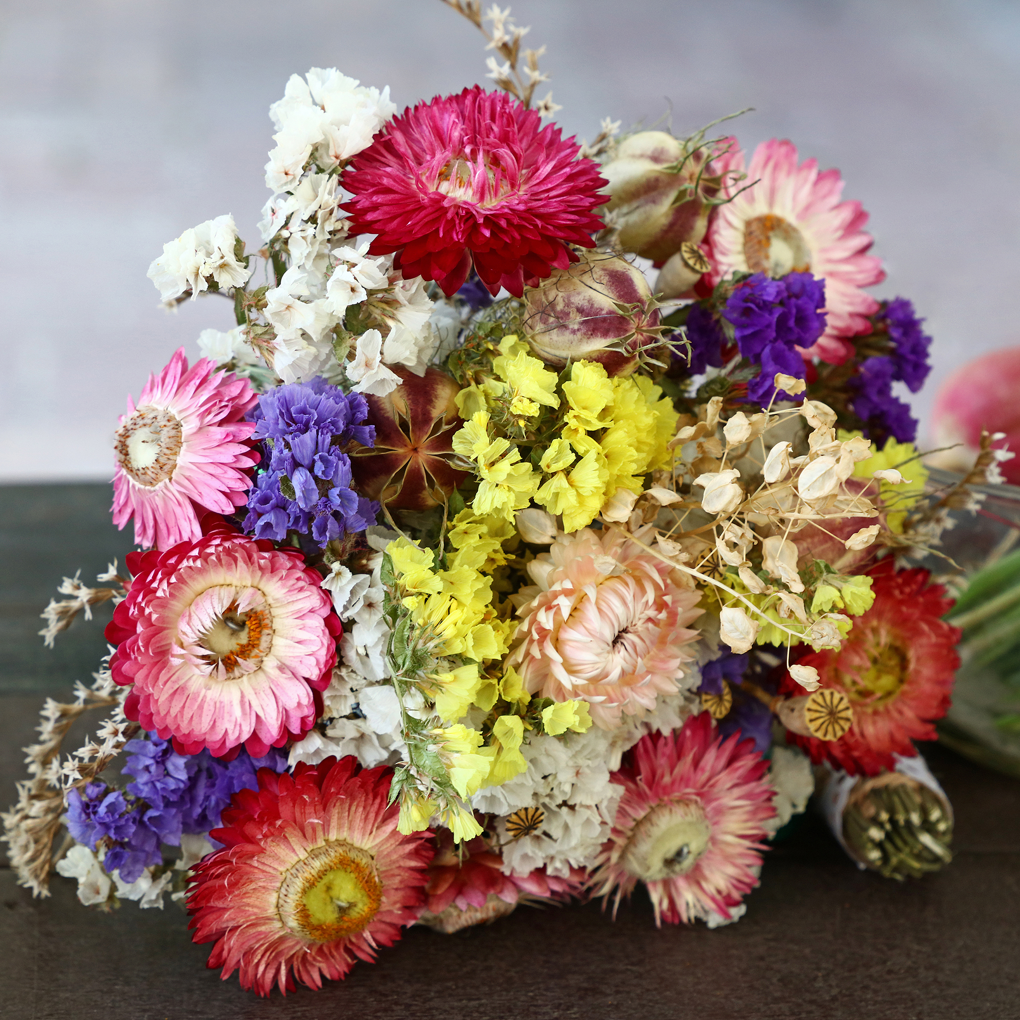 Bunch of dried flowers on table top
