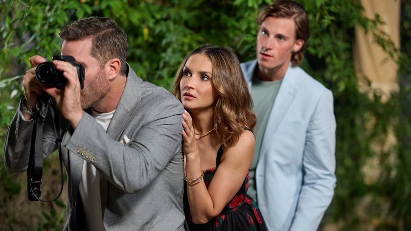 Luke Macfarlane, Rachael Leigh Cook and Jegors Davilov are shown in the 2026 Hallmark Channel premiere Caught by Love.