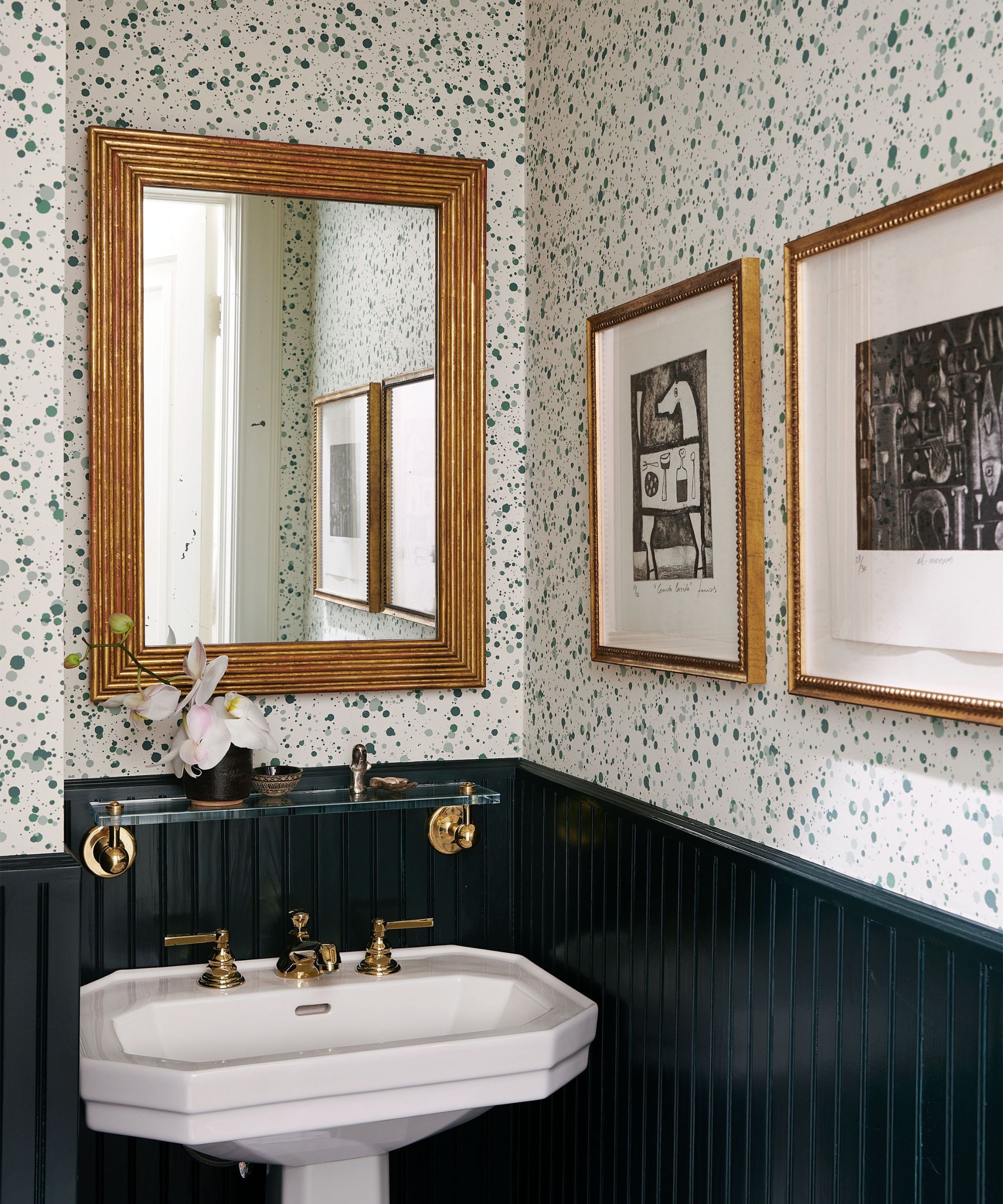 powder room with paneling and wallpaper