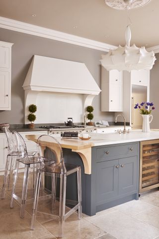 Ghost chairs as kitchen island seating for a Secret Drawer kitchen
