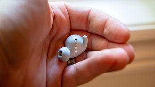 Google Pixel Buds A-Series earbud in-hand