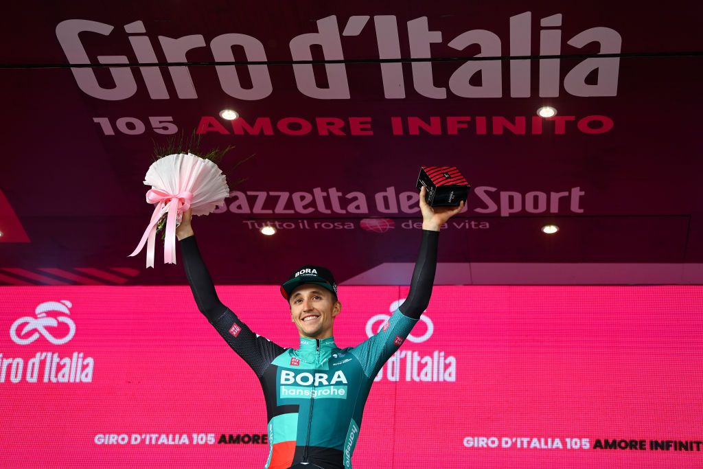 BLOCKHAUS ITALY MAY 15 Jai Hindley of Australia and Team Bora Hansgrohe celebrates winning the stage on the podium ceremony after the 105th Giro dItalia 2022 Stage 9 a 191km stage from Isernia to Blockhaus 1664m Giro WorldTour on May 15 2022 in Blockhaus Italy Photo by Tim de WaeleGetty Images