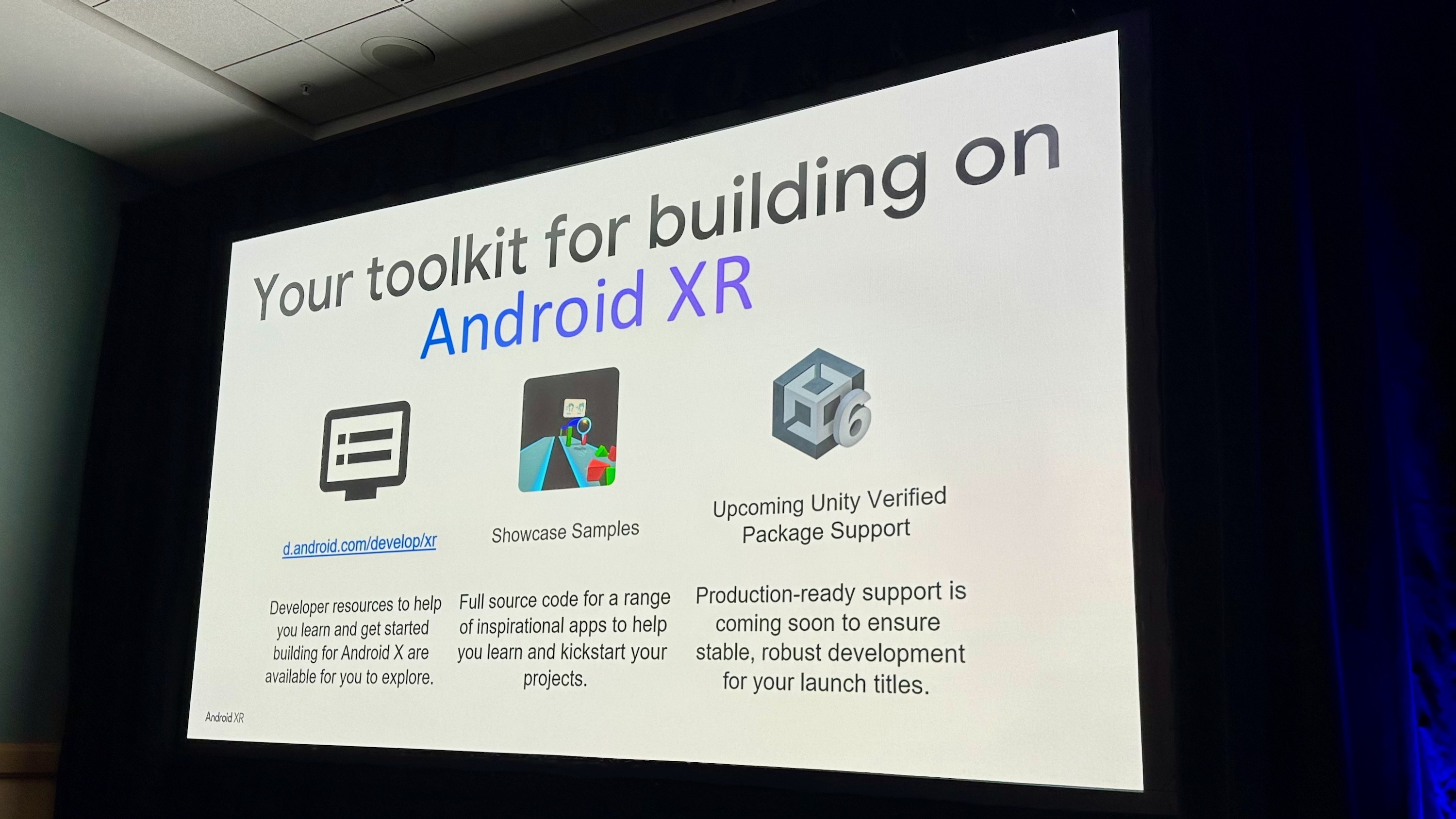 A screen at AWE 2025 showing the text "Your toolkit for building on Android XR" with Showcase Samples, Unity Verified Package Support, and a URL for Android XR developer tools.