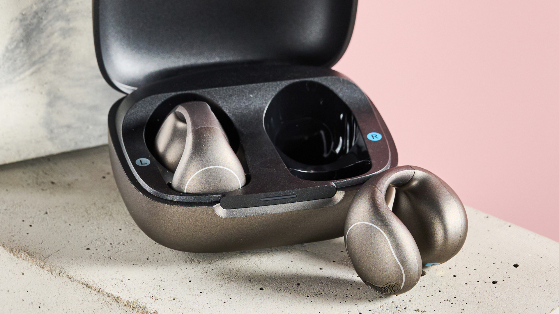 Anker Soundcore C40i with one of the earbuds outside of the charging case