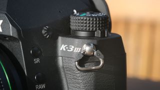 The Pentax K-3 III DSLR, showing the K-3 III logo on the front