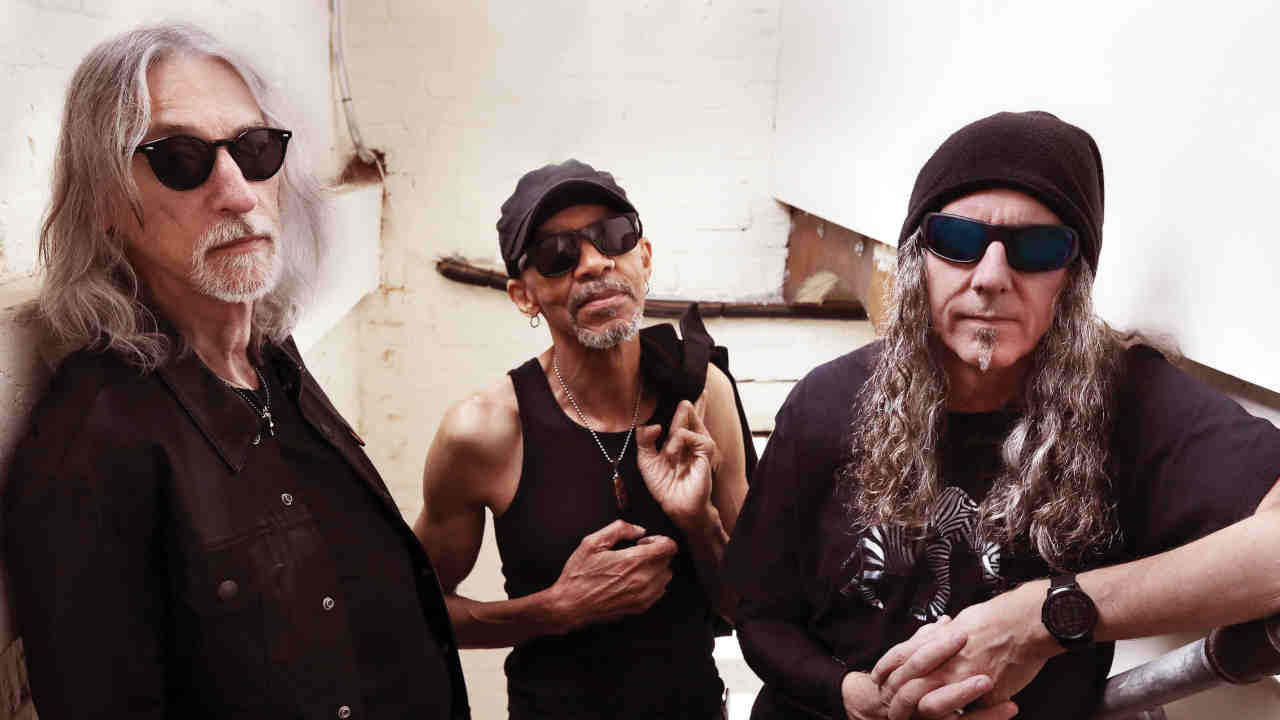 King’s X posing for a photograph in 2022