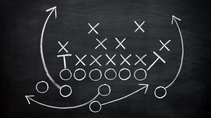 image of football strategy on blackboard