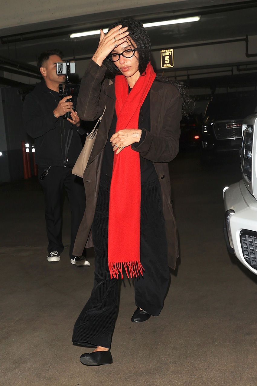 Zoe Kravitz wearing a long red scarf