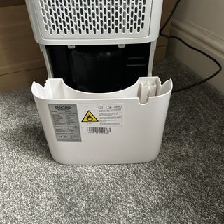 The rear of the ElectriQ 12L dehumidifier with the water tank pulled out