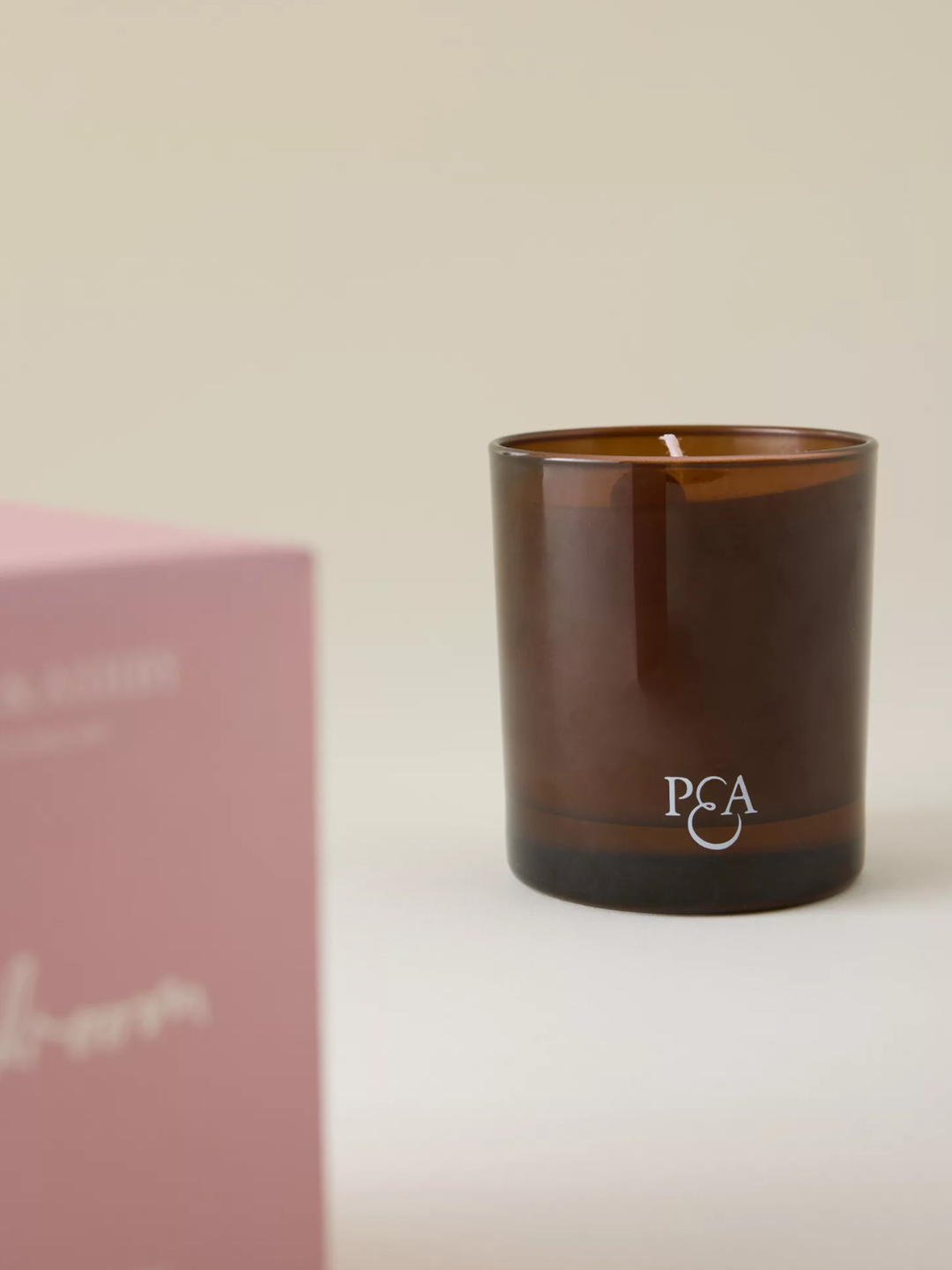 An amber glass lavender and amber bedroom candle from Plum &amp;amp; Ashby
