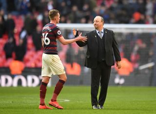 Rafael Benitez, Manager of Newcastle United shakes hands with Sean Longstaff of Newcastle United after the Premier League match between Tottenham Hotspur and Newcastle United at Wembley Stadium on February 2, 2019 in London, United Kingdom