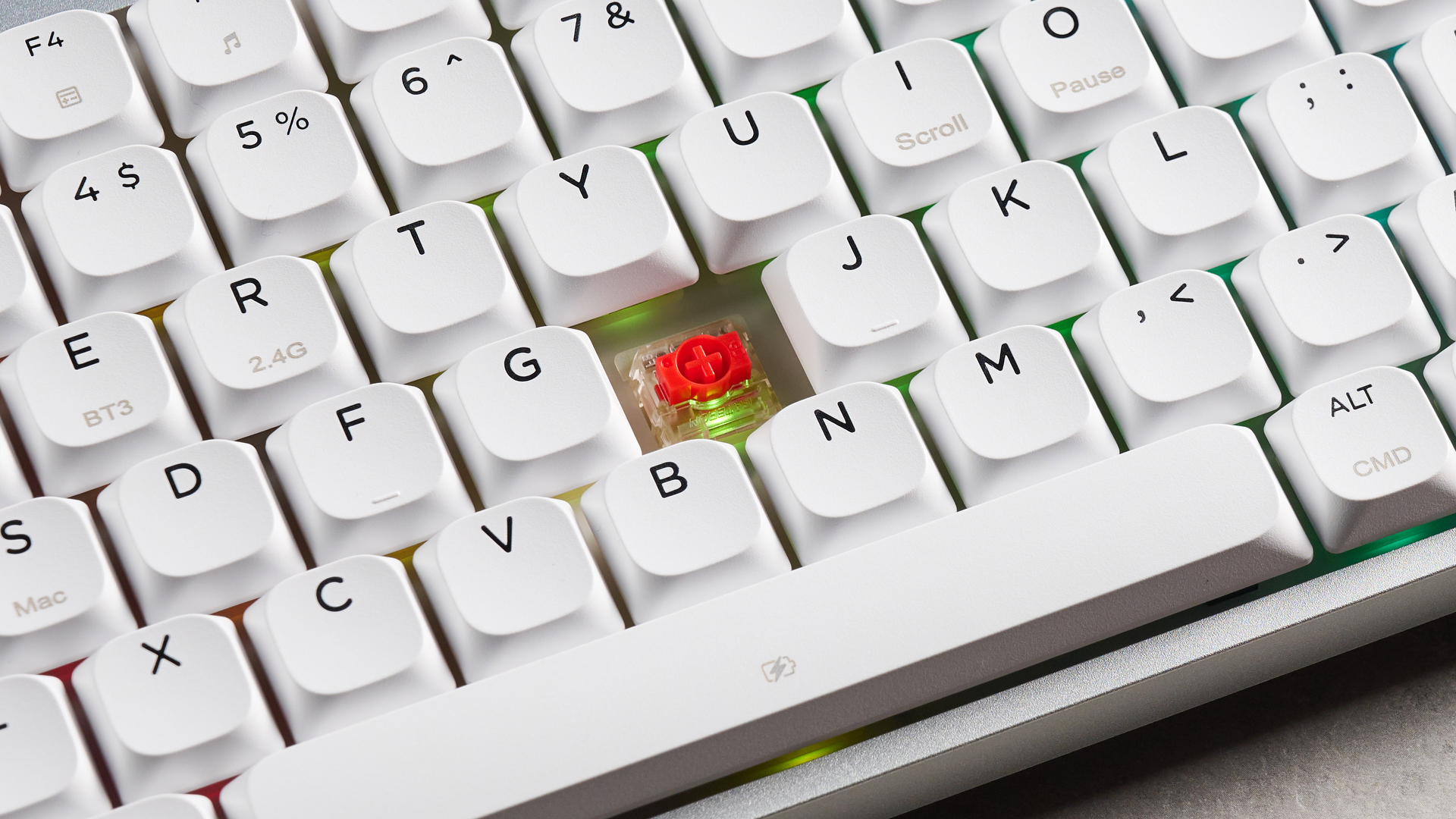 A white and purple Epomaker Luma84 low-profile mechanical keyboard