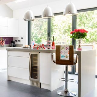 kitchen room with white wall and window