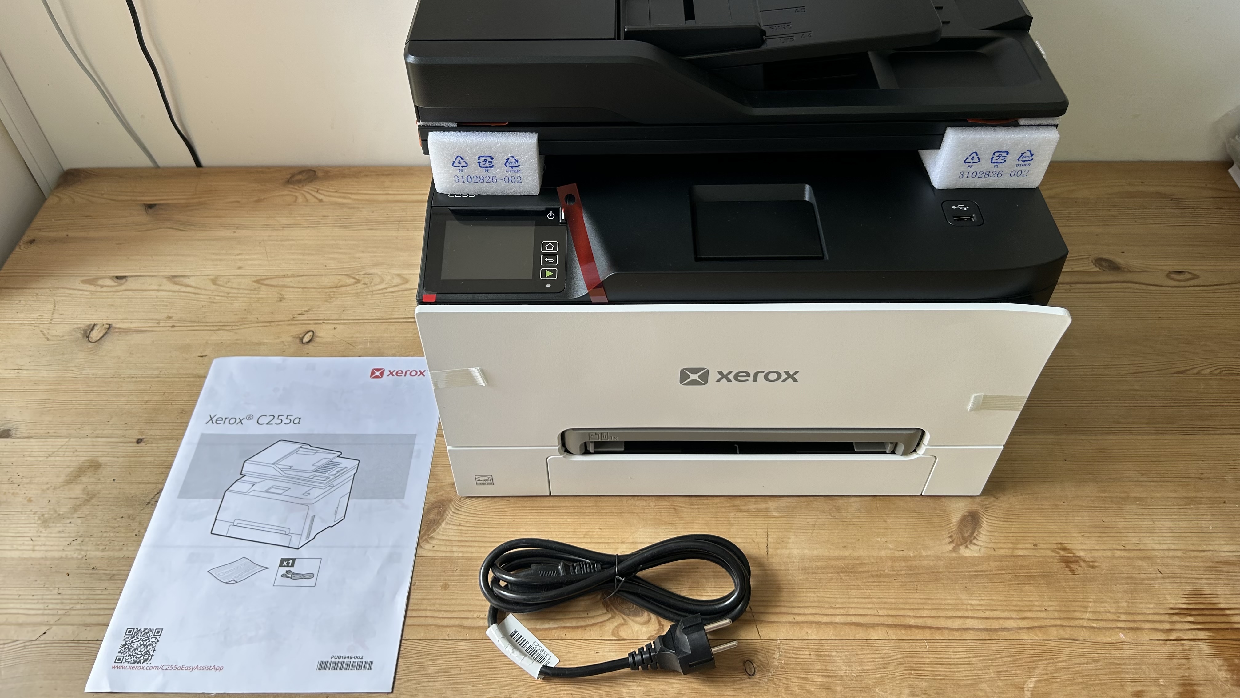 The Xerox C255a on a table in a home office during our tests