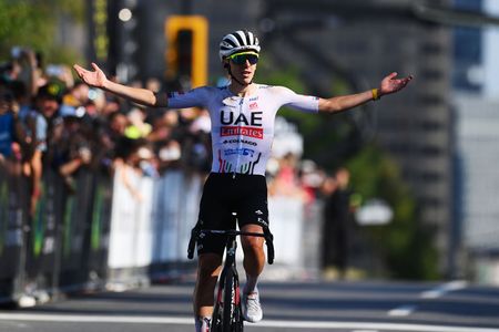 Tadej Pogacar celebrates at finish line as race winner during the 13th Grand Prix Cycliste de Montreal 2024