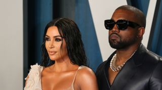 US media personality Kim Kardashian (L) and husband US rapper Kanye West attend the 2020 Vanity Fair Oscar Party following the 92nd Oscars at The Wallis Annenberg Center for the Performing Arts in Beverly Hills on February 9, 2020