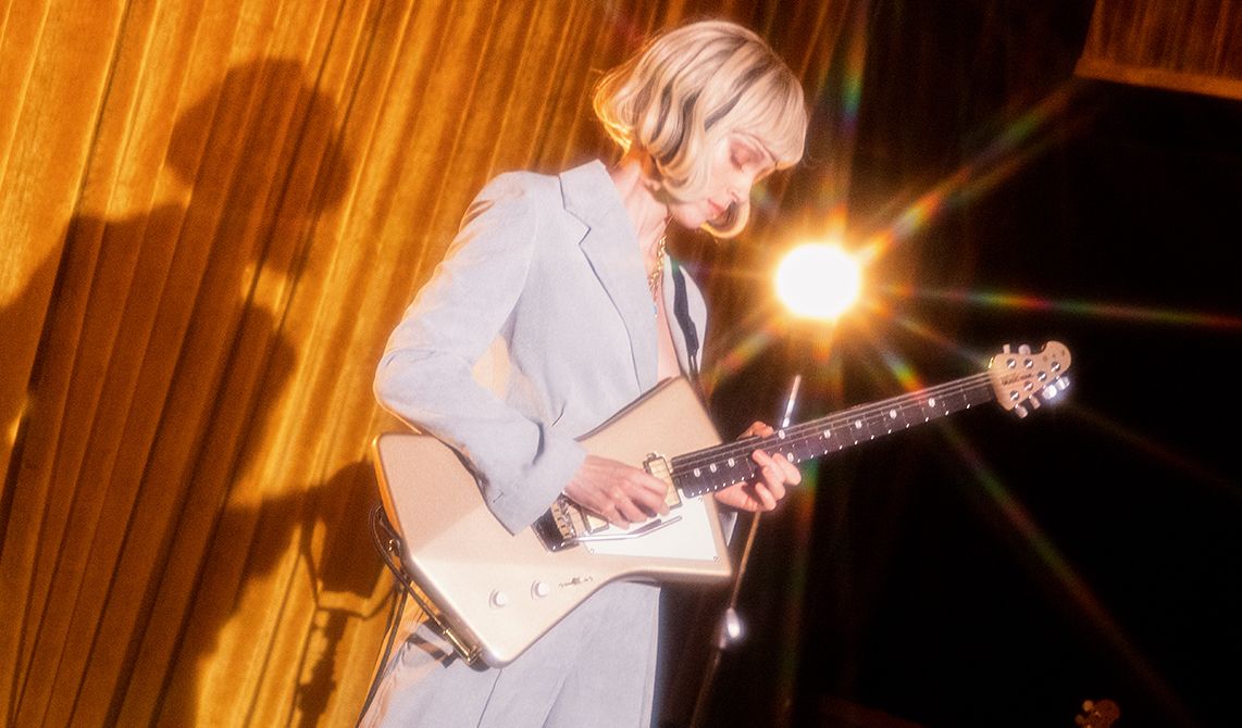 St. Vincent with her new Ernie Ball Music Man signature Goldie guitar