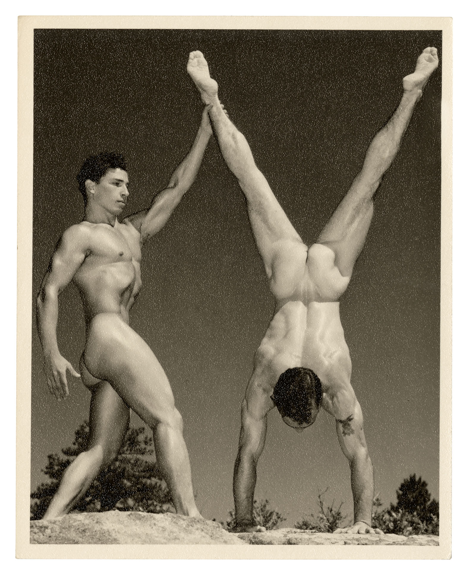 black and white image of naked men