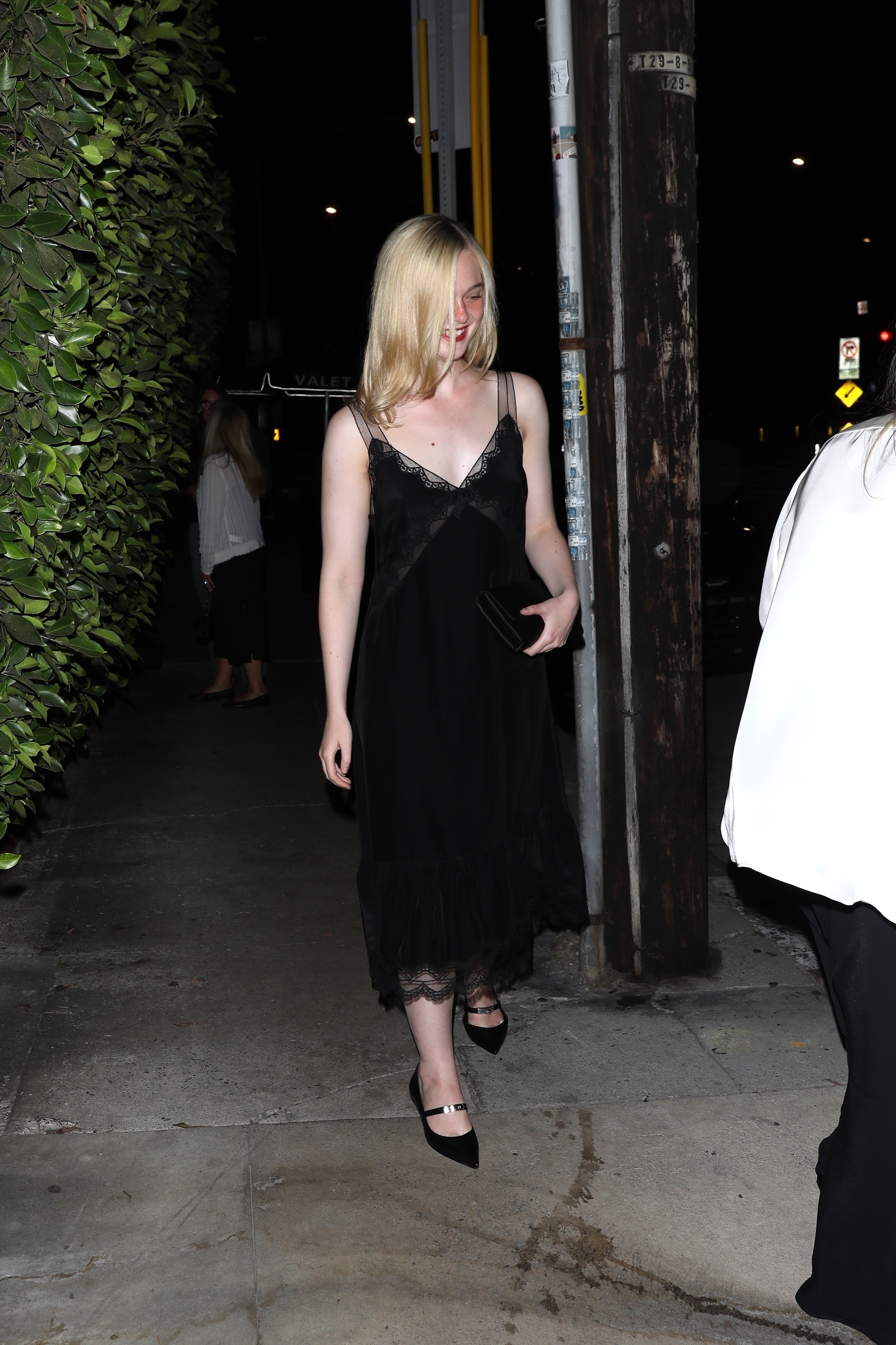 Elle and Dakota Fanning enjoyed a night out together in minimalist outfits