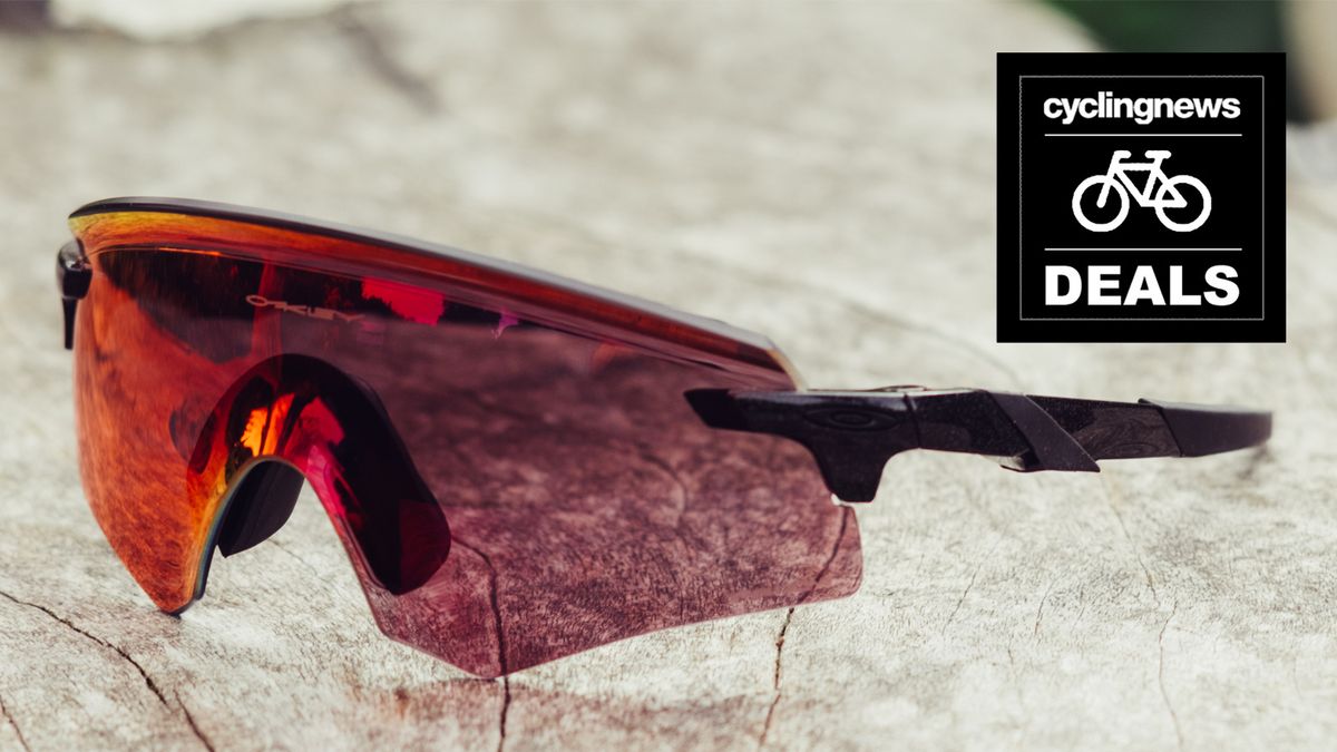 A pair of Oakley Encoder sunglasses overlaid with a &#039;deals&#039; logo