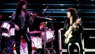 Joe Lynn Turner (left) and Ritchie Blackmore perform with Deep Purple at the Hammersmith Odeon in London on March 14, 1991