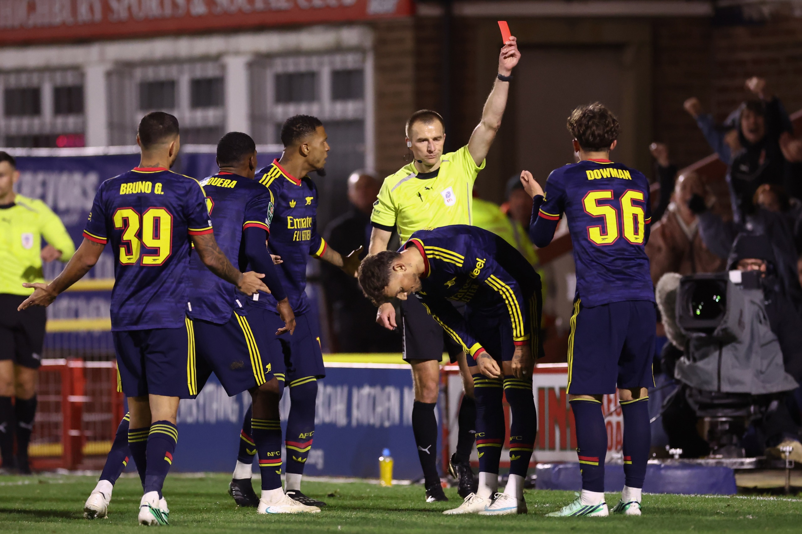 Max Dowman of Arsenal receives the red card from referee Michael Salisbury during the Carabao Cup Fourth Round