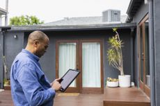 A home appraiser evaluating a home's exterior