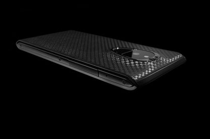 side-fire-black-carbon-dlc-930x615.jpg
