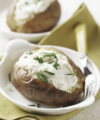 Baked potato with sour cream and chives