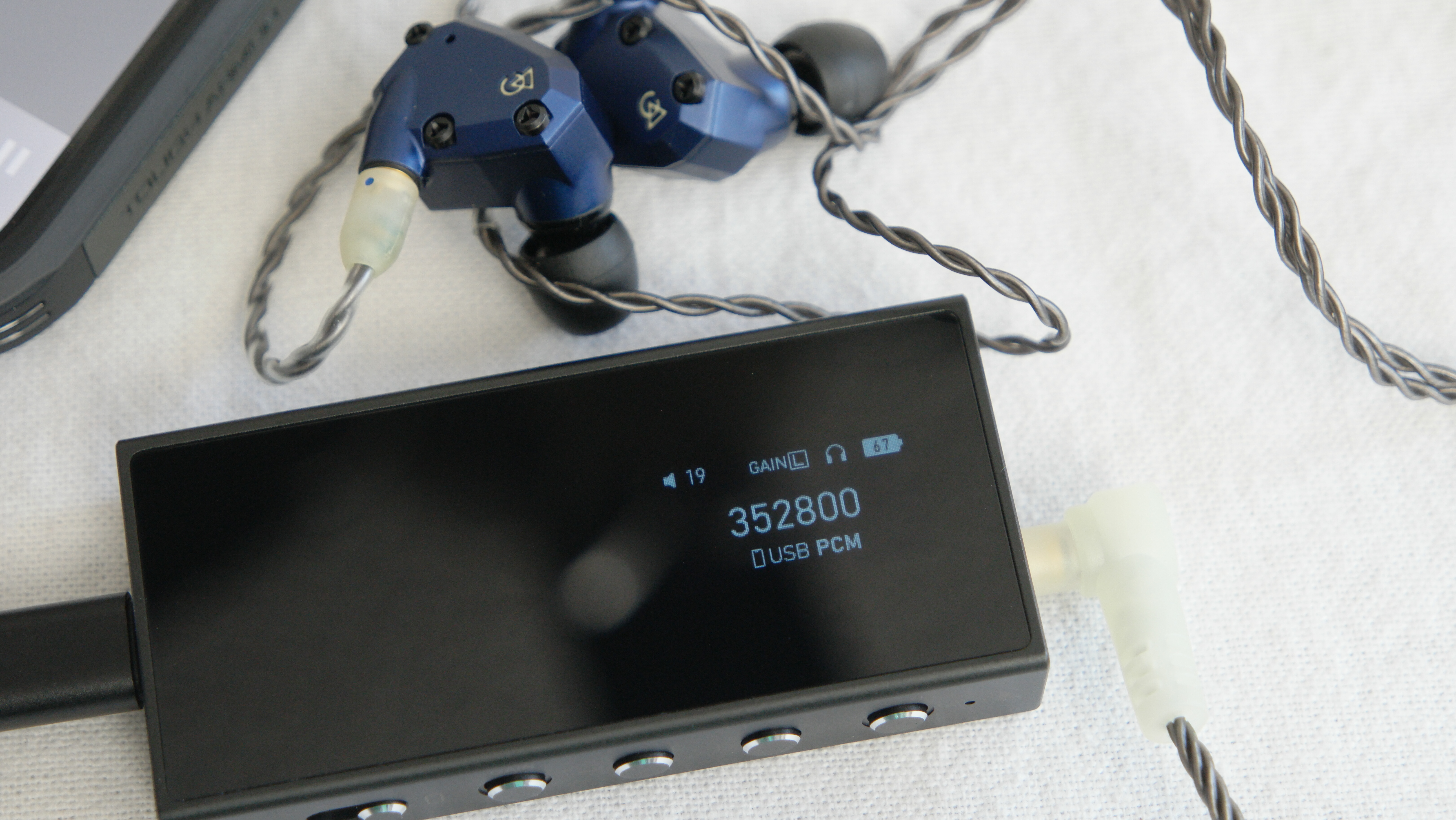 Questyle M18i showing PCM file sample rate and Low gain in use
