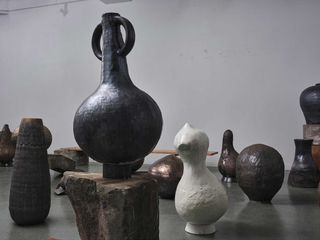 Clay vessels with exhibition showcases