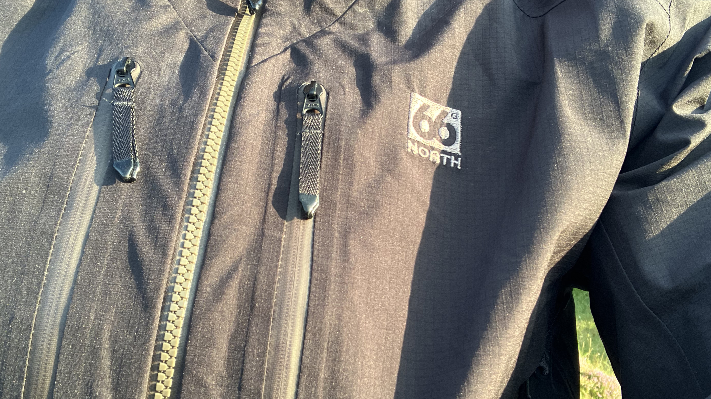 Close up of 66° North logo