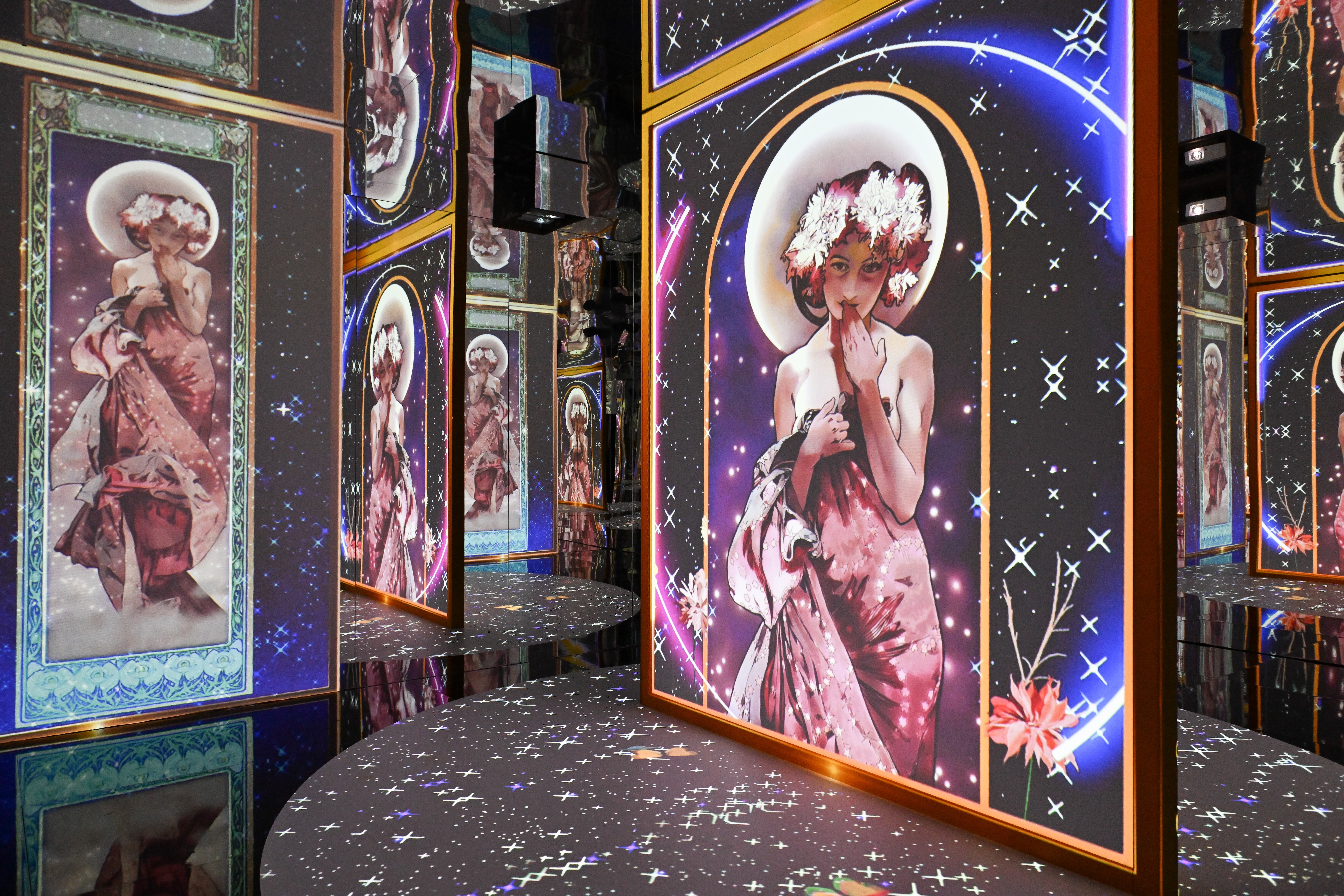 Alphonse Mucha art on digital displays in Rome