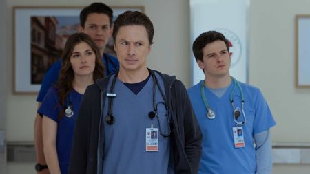Sam, Blake, J.D, and Asher walking down a hall in Scrubs season 10 episode 7