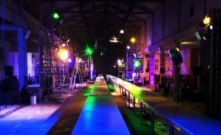 Fashion runway located within an industrial warehouse