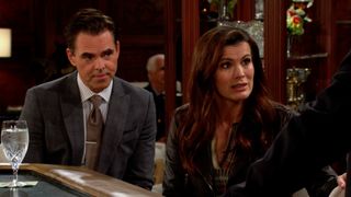 Jason Thompson and Melissa Claire Egan as Billy and Chelsea at a dinner table in The Young and the Restless