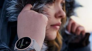 Woman wearing Garmin Fenix 6S watch