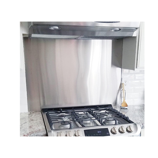 Range oven with stainless steel backsplash