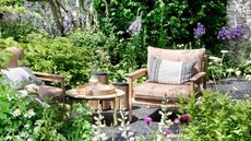 courtyard garden with seats, table and flowers