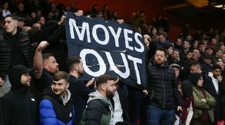 West Ham fans show their frustration at manager David Moyes with a "Moyes Out" banner at Nottingham Forest in February 2024.