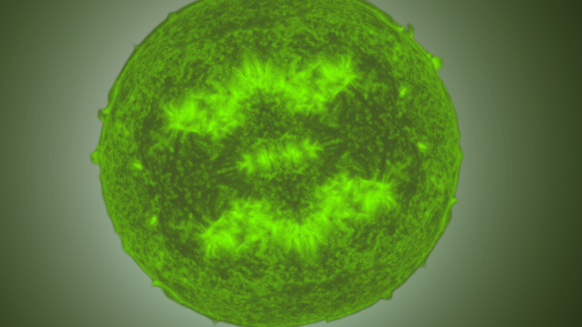 A green sphere with dark patches