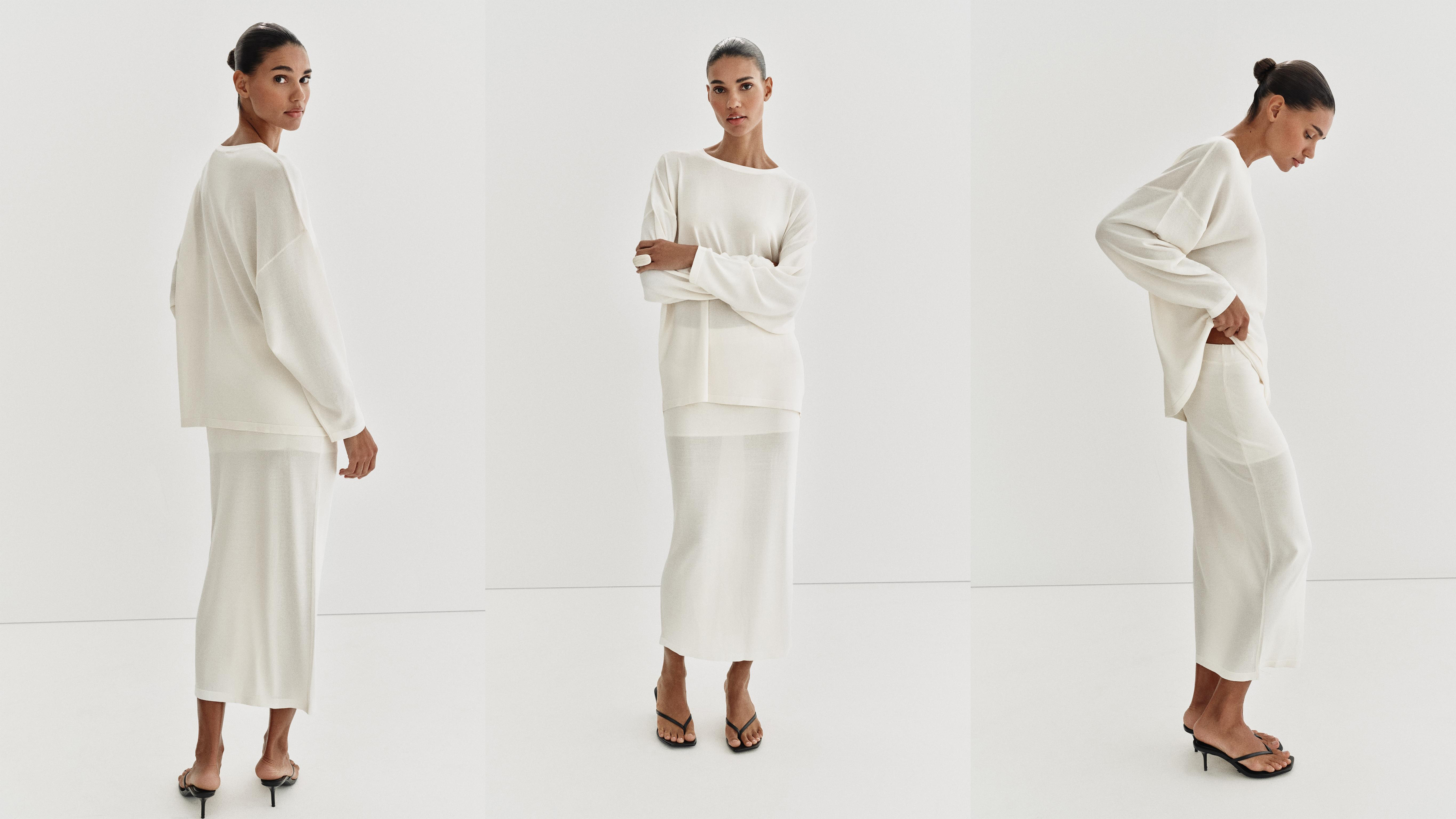 Zara model wearing a white knit set and heeled flip-flops.