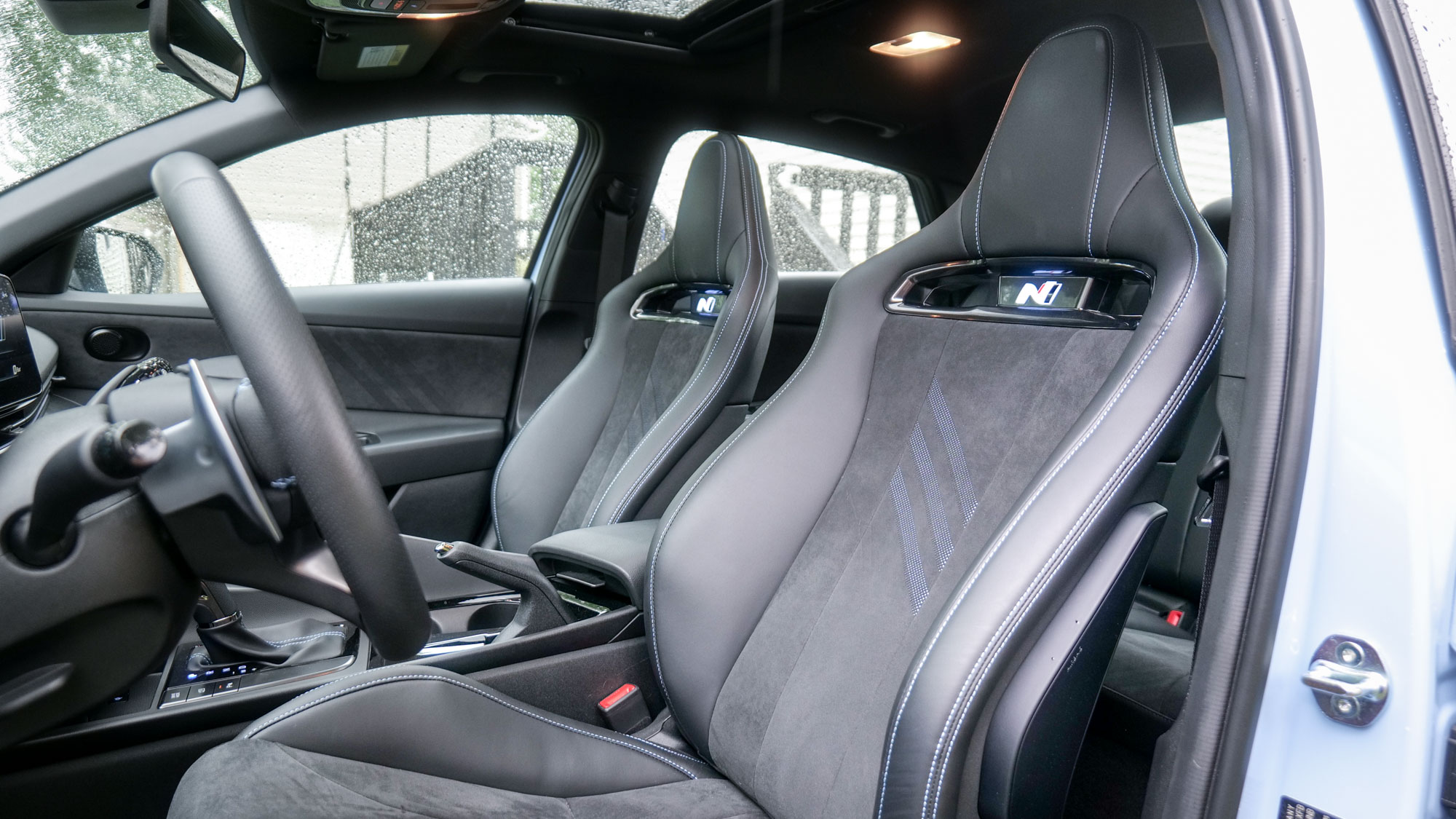 2025 Hyundai Elantra N test drive review pros and cons.