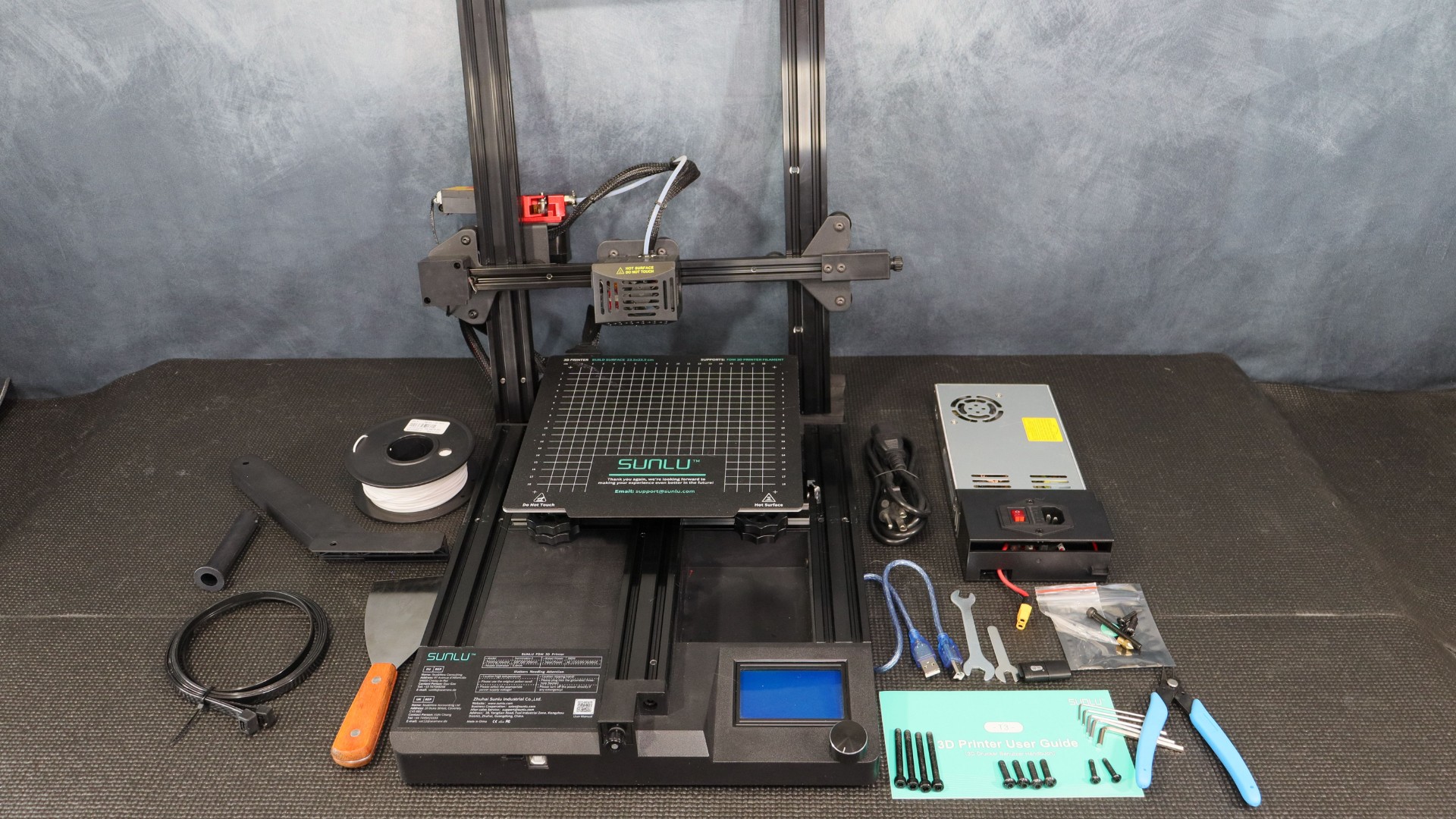 Sunlu Terminator 3 (T3) 3D printer alongside the included tools and accessories.