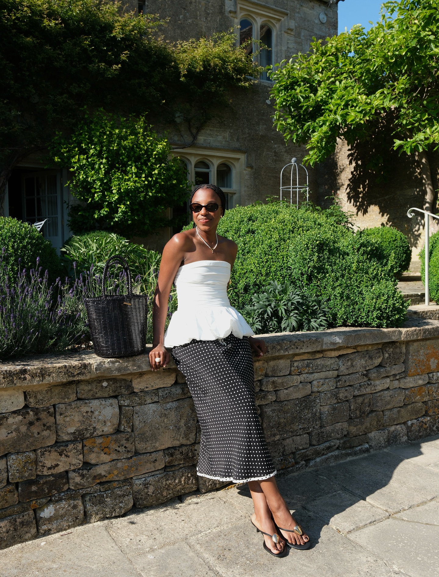 Rich looking summer outfits: @taffymsipa wears a strapless top and polka dot skirt