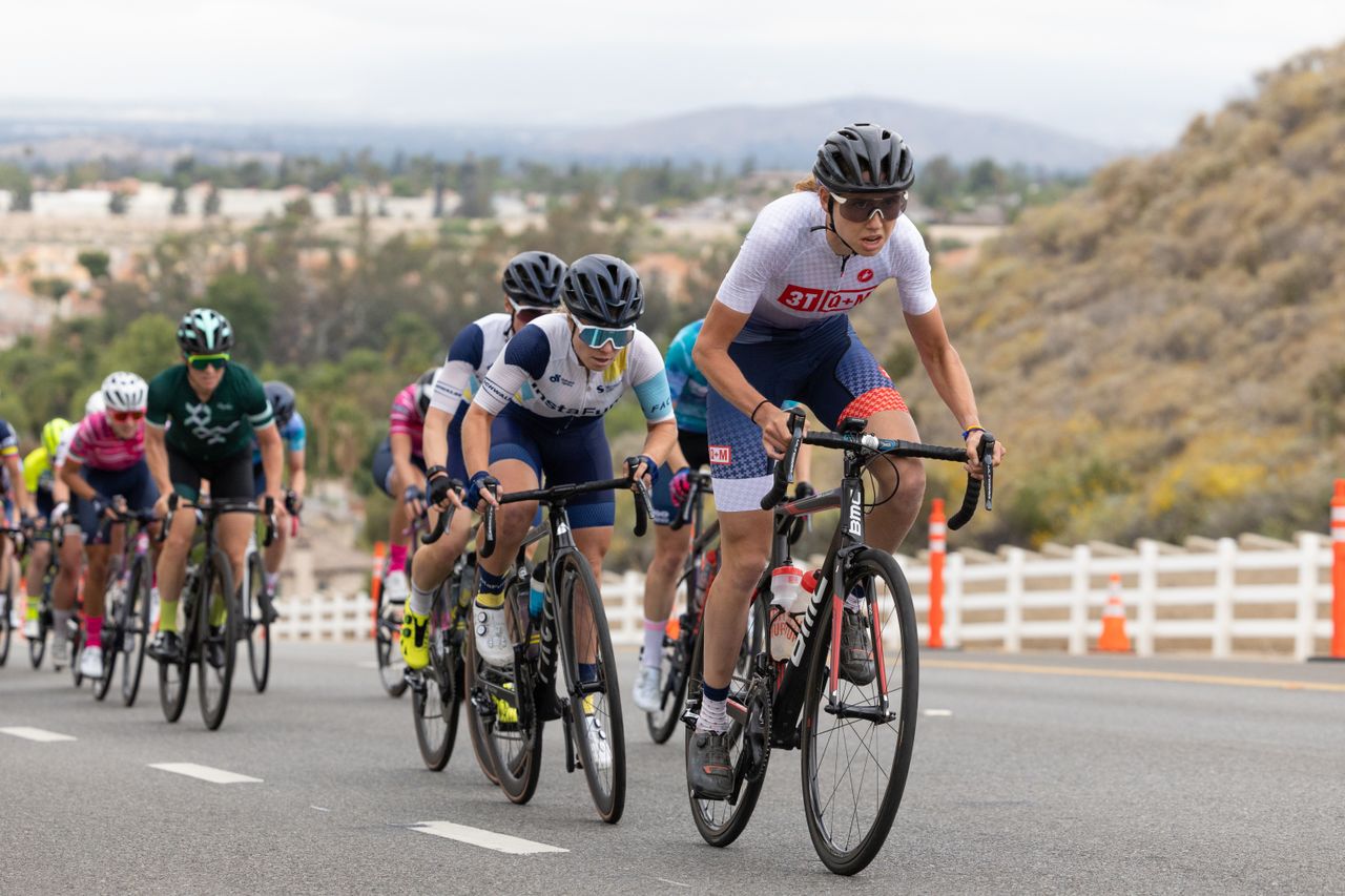Emily Marcolini from 3T/Q+M Cycling attacked on the intermediate QOM point laps and finished 3rd overall on the stage to take the red QOM jersey heading into stage 2.