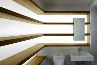 Atmospheric lighting under shelves in bathroom