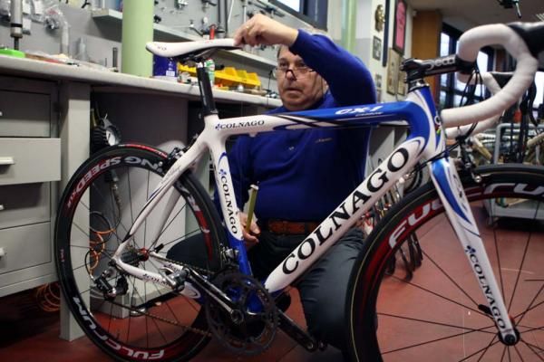 Paolo Colnago makes some final tweaks to the team bikes