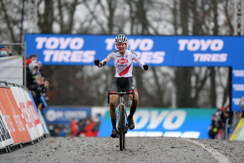 NAMUR BELGIUM DECEMBER 19 Puck Pieterse of The Netherlands and Team AlpecinFenix celebrates winning the third place during the 13th Namur UCI CycloCross Worldcup 2021 Womens Elite UCIWT on December 19 2021 in Namur Belgium Photo by Luc ClaessenGetty Images