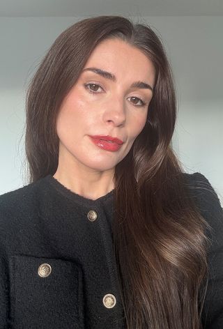 Eleanor wearing Hourglass Glossy Balm in shade Red